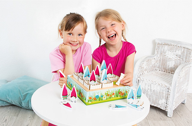 Kinder spielen mit Lernspiel Happy & Harmony von beleduc